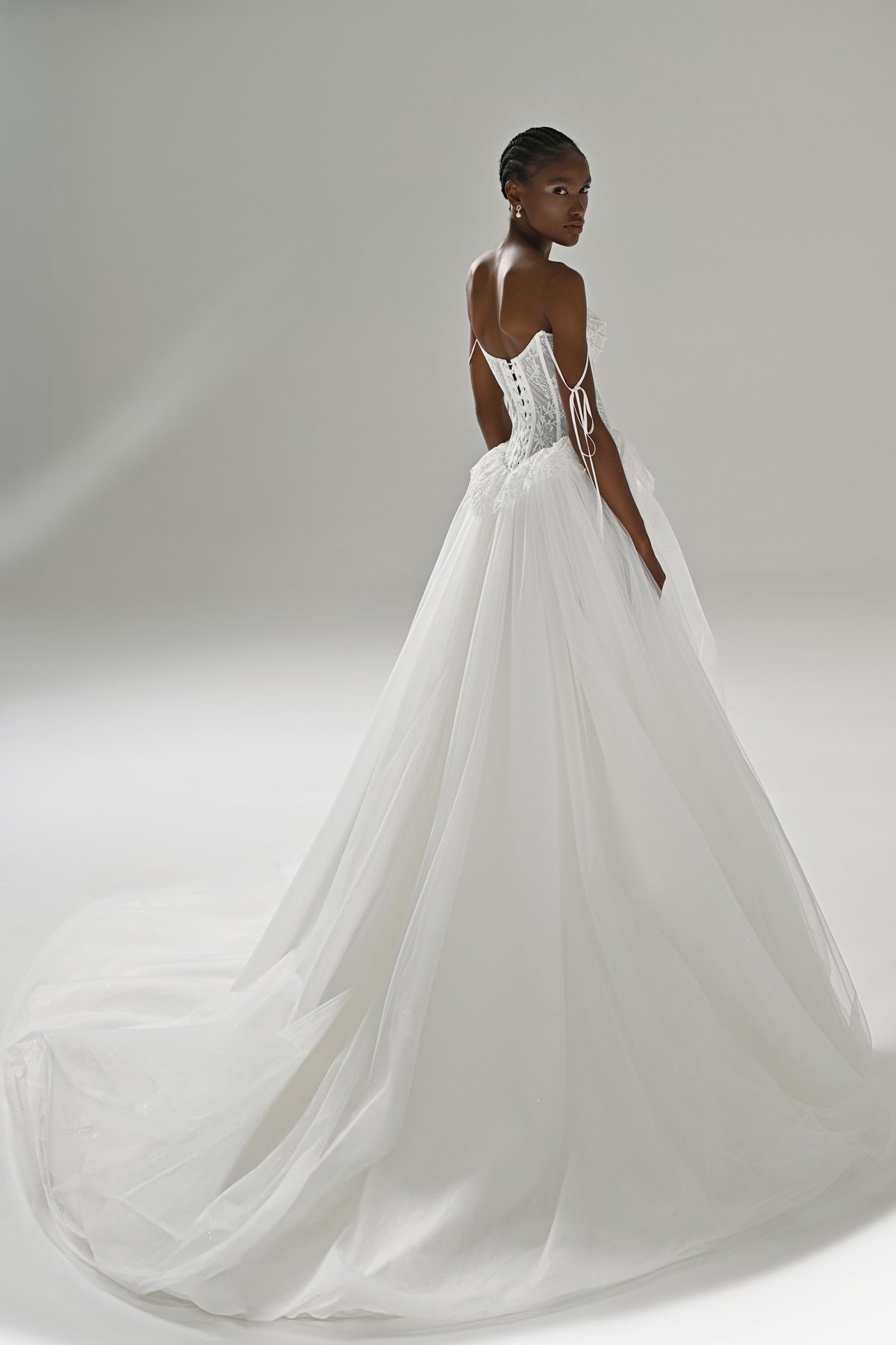 Lace and tulle ball gown wedding dress – back view with the long tulle train