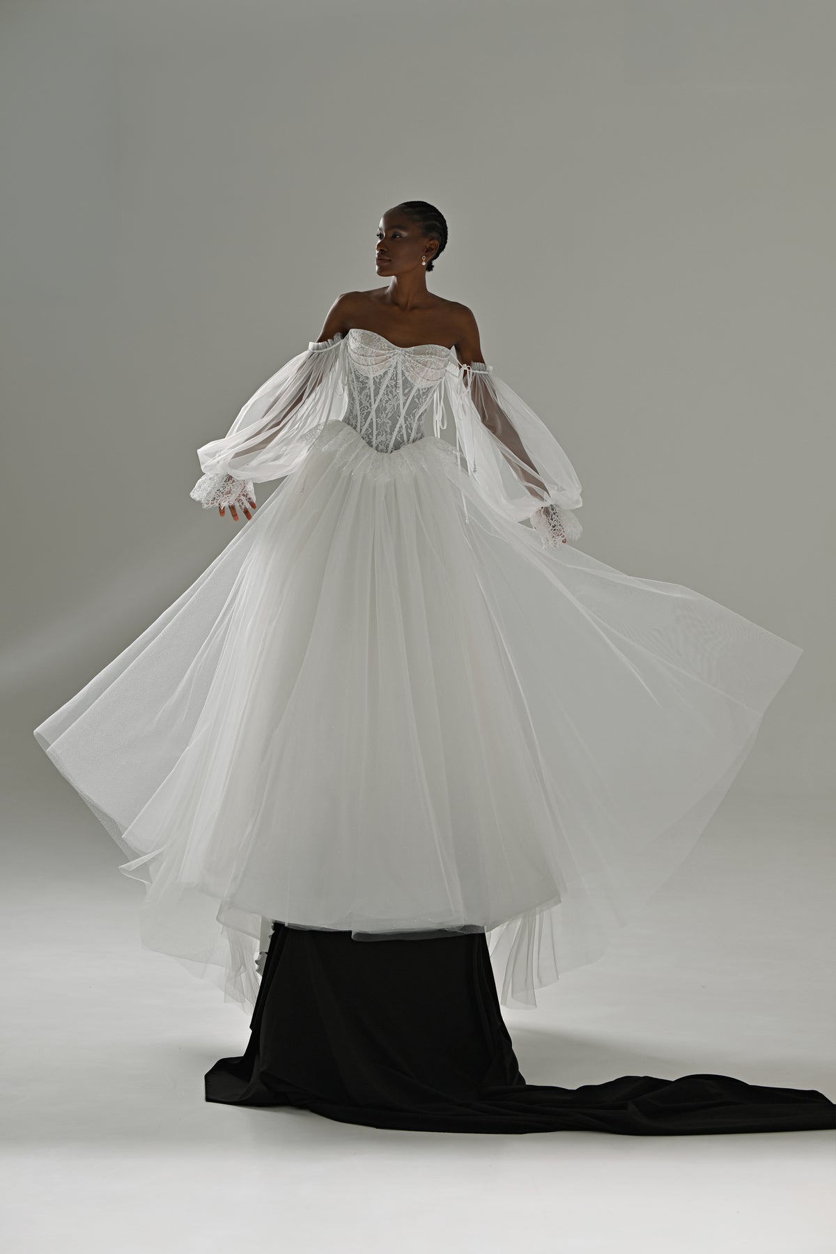 Lace and tulle ball gown wedding dress with off-shoulder corset – front view with the flared detachable tulle overskirt