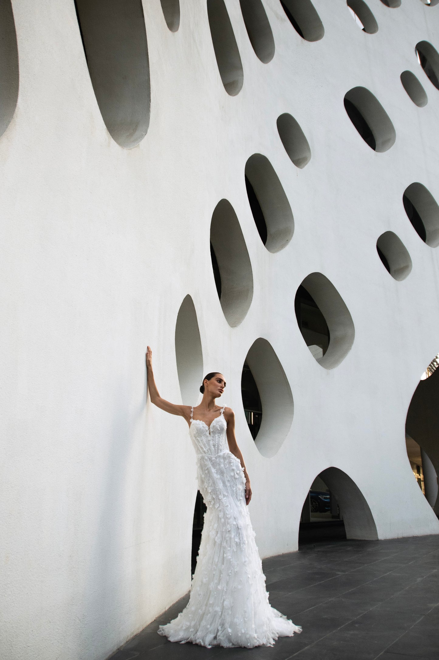 Bride wearing the Capri lace and tulle mermaid wedding gown from the Celeste Collection.