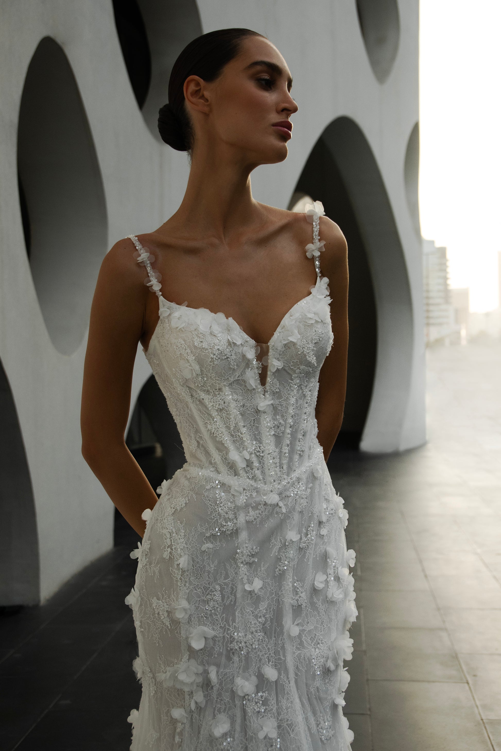 Bride wearing the Capri lace and tulle mermaid wedding gown from the Celeste Collection.