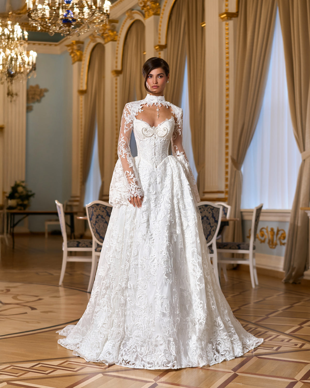 A-line lace ball gown with strapless pearl corset bodice and lace bolero with bell sleeves