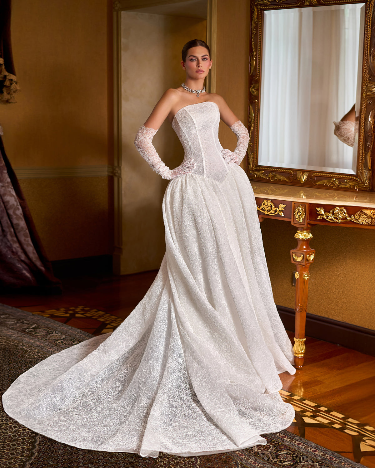 Ball gown wedding dress with strapless lace corset bodice, drop waist, full skirt and long lace gloves