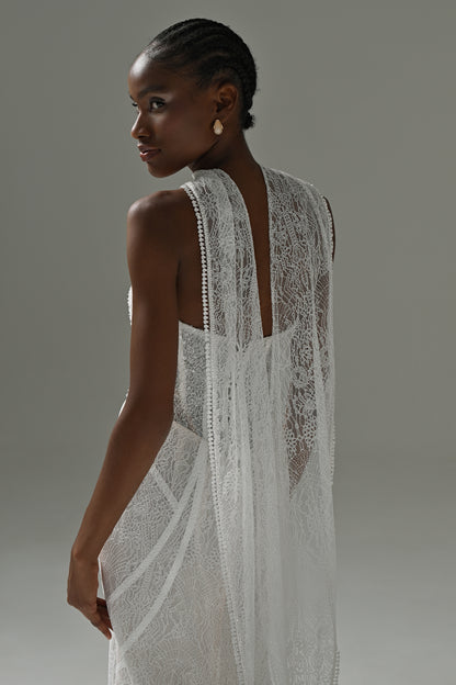 Lace mermaid wedding dress with scarf collar – back view of the sheer lace back and draped scarf