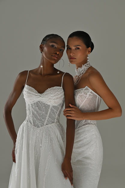 Tulle A-line wedding dress with lace corset, sweetheart neckline and spaghetti straps – two brides close together