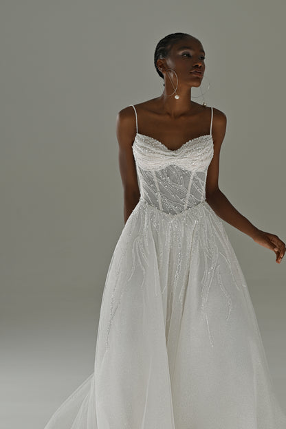 Tulle A-line wedding dress with lace corset and spaghetti straps – three-quarter front view