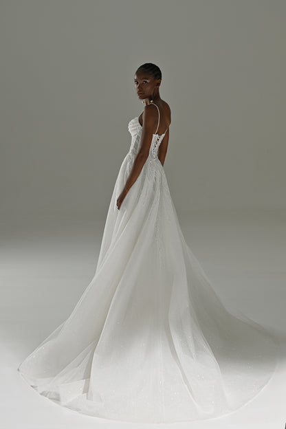 Tulle A-line wedding dress – back three-quarter view with the flowing tulle train