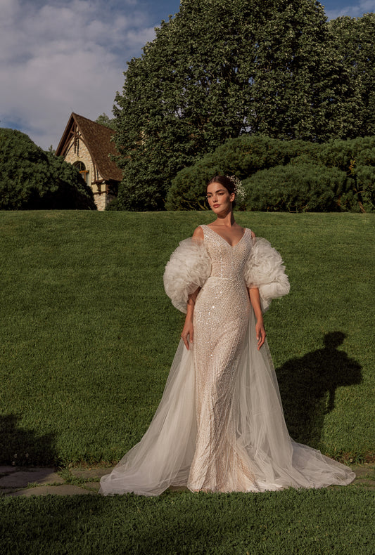 Sleeveless sheath wedding dress with tulle and sequin details