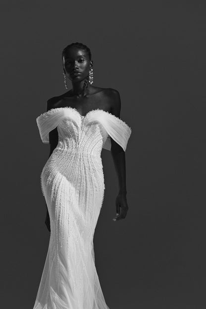Lace mermaid wedding dress with off-shoulder draped neckline – black and white three-quarter front view