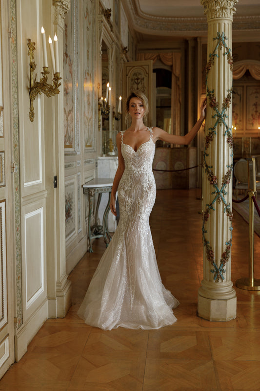 Fitted wedding dress with detachable chapel overskirt 