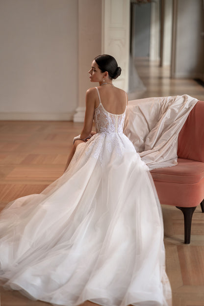 A-line wedding dress with spaghetti straps and boat neckline