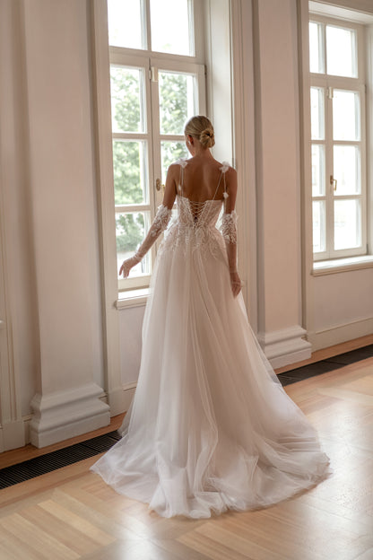 Romantic A-line tulle wedding dress with 3D floral elements