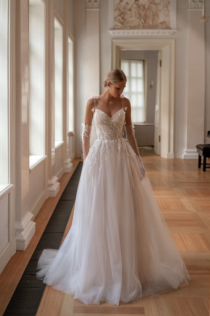 Romantic A-line tulle wedding dress with 3D floral elements