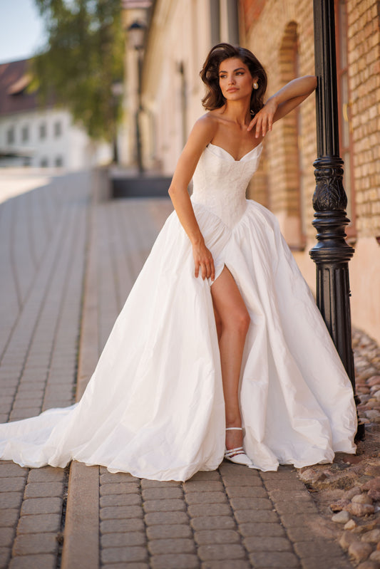 Princess wedding dress with chapel train and lace-up corset