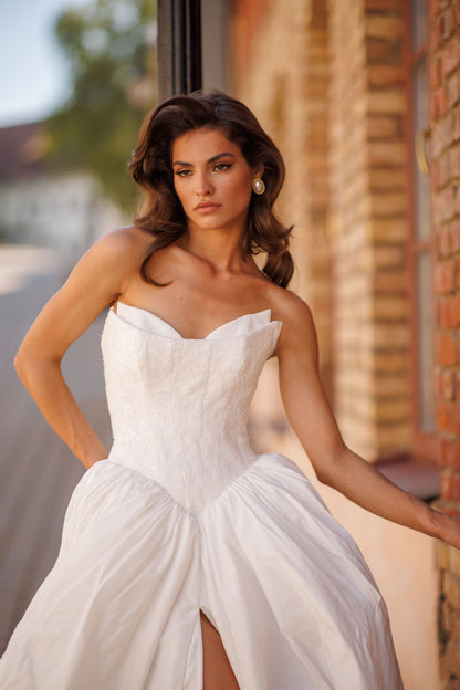 Princess wedding dress with chapel train and lace-up corset