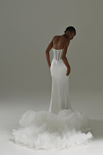 Stretch satin mermaid wedding dress – back view of the corset bodice and ruffled tulle train