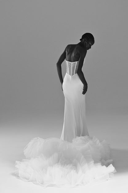 Stretch satin mermaid wedding dress – black and white back view of the corset and ruffled tulle skirt