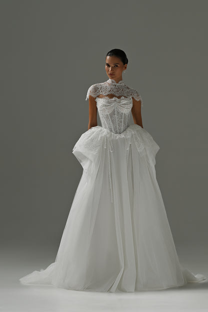 Tulle wedding dress with lace corset bodice and peplum frill – full-length front view