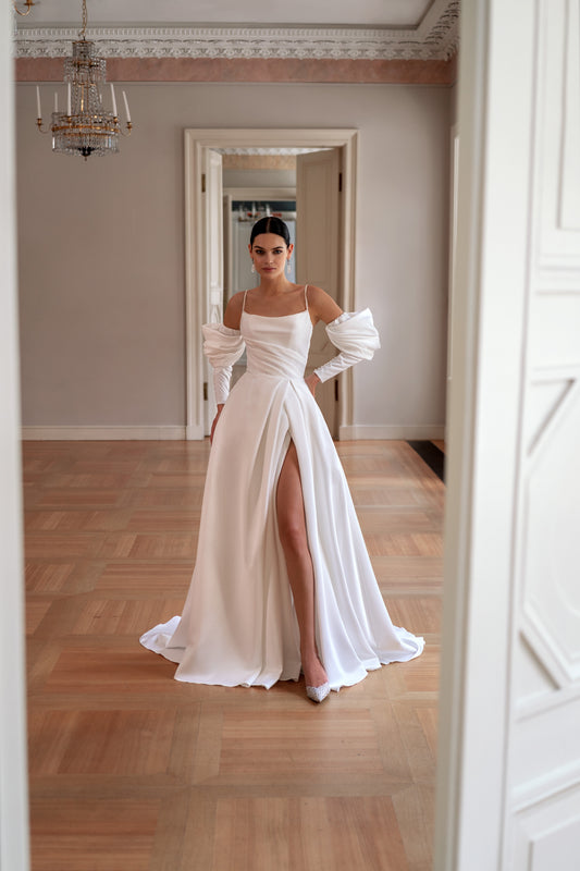 Minimalist wedding dress with boat neckline and removable sleeves