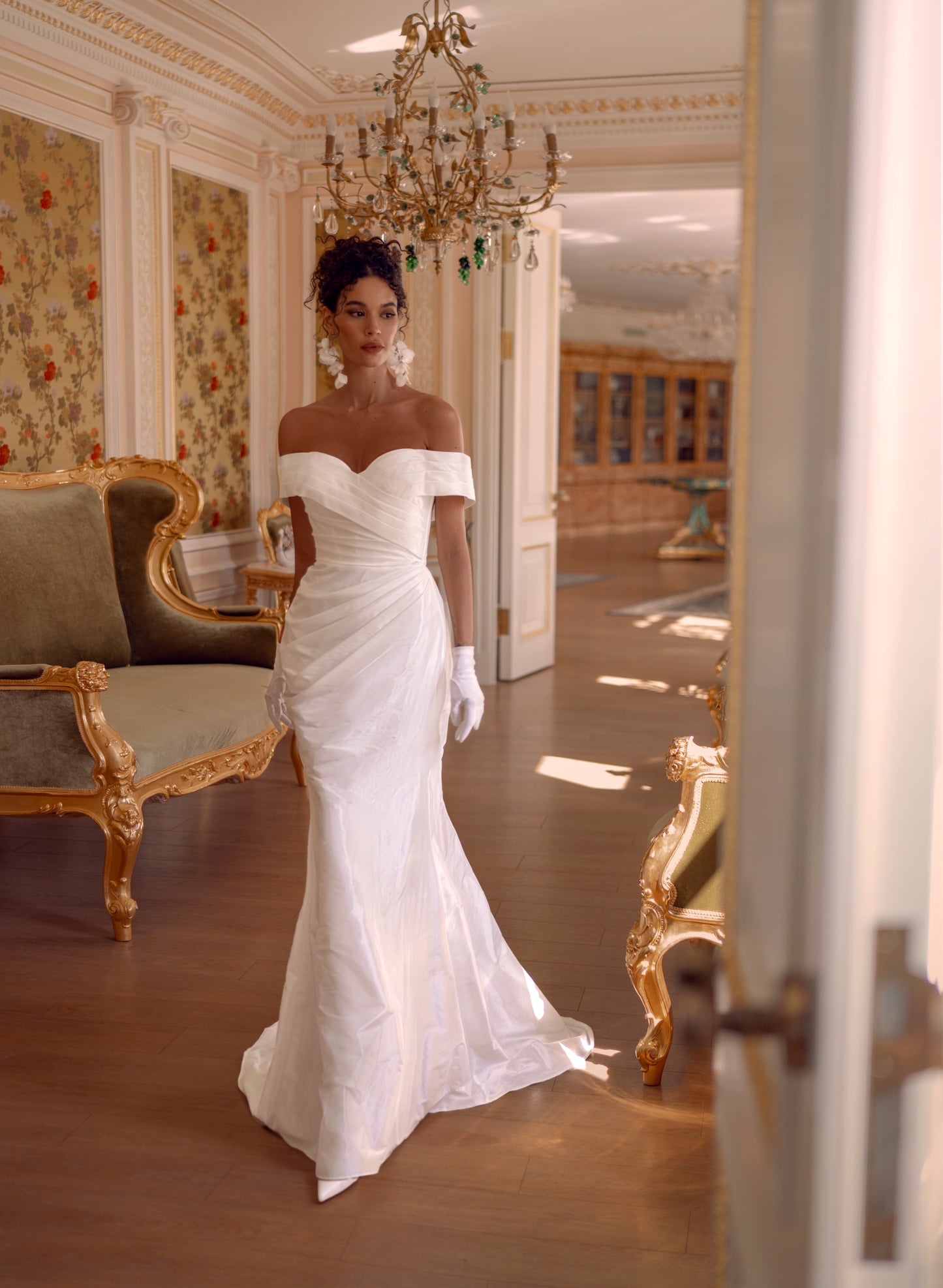 off-shoulder taffeta mermaid wedding dress with pleated bodice and detachable ball gown overskirt