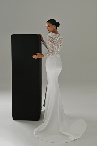 Beaded lace sheath wedding dress – side view with the fitted skirt and small train