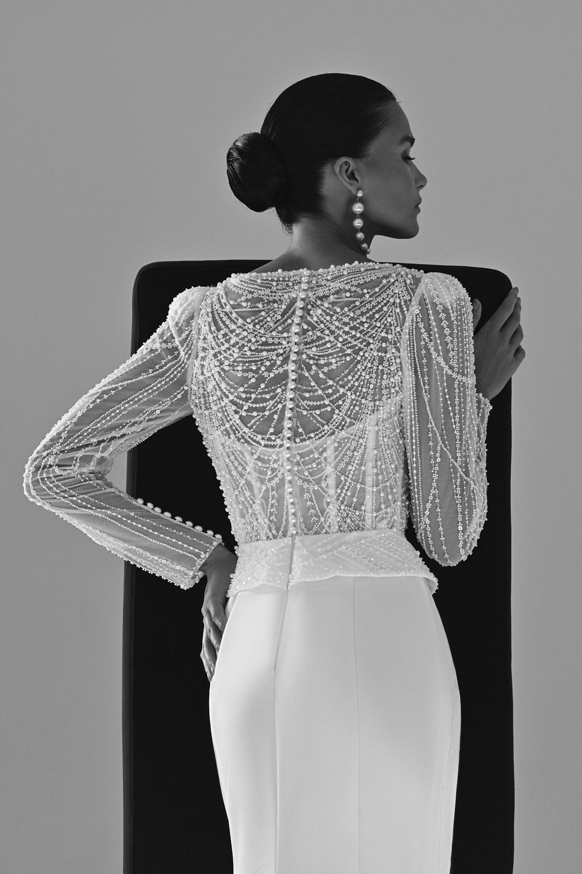 Beaded lace sheath wedding dress – black and white back view of the lace bodice and sleeves