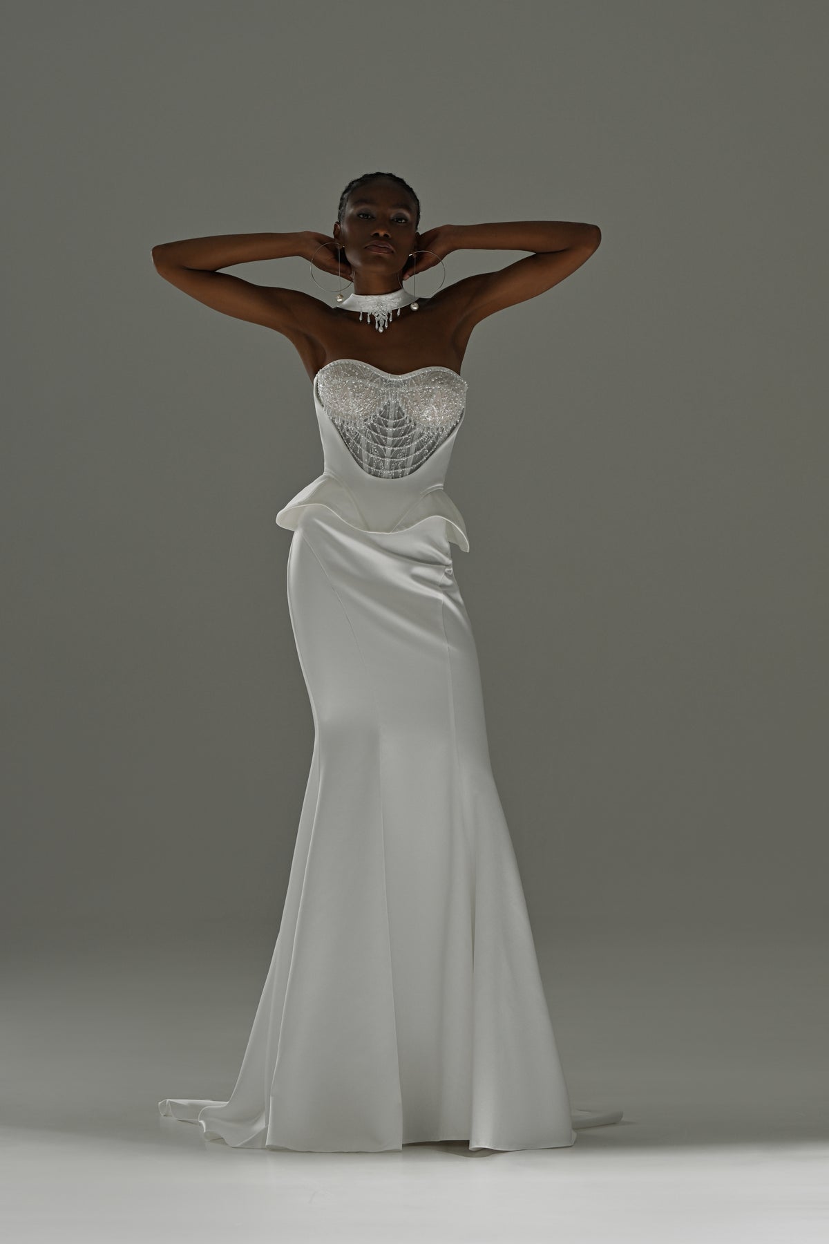 Soft satin mermaid wedding dress with lace corset – full-length front view, hands behind the head