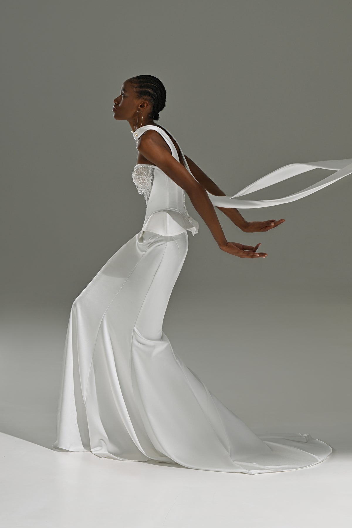 Soft satin mermaid wedding dress with lace corset – side view with the sheer scarf flying