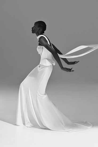 Soft satin mermaid wedding dress – black and white side view with the sheer scarf in motion