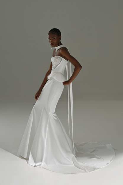 Soft satin mermaid wedding dress with sheer scarf – three-quarter view of the fitted satin skirt and train