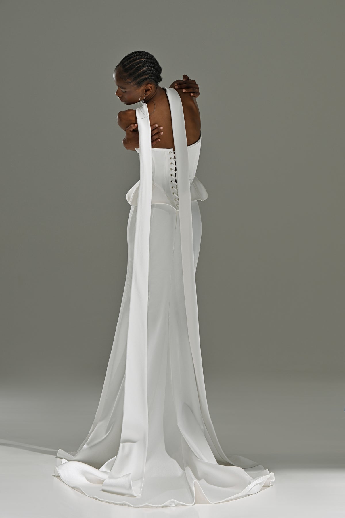 Soft satin mermaid wedding dress with scarf – back view of the long scarf and train