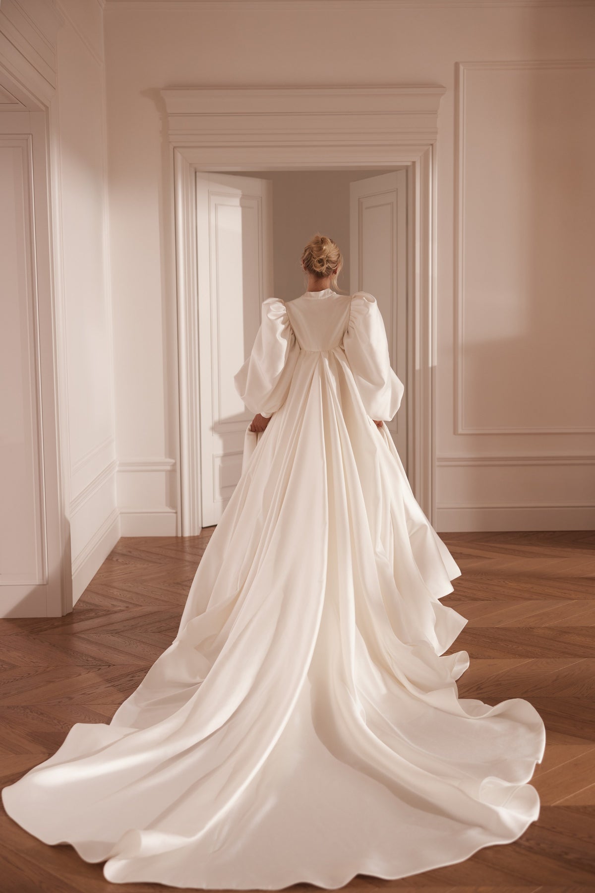 A-line mikado wedding dress with corset bodice and detachable cape - back view