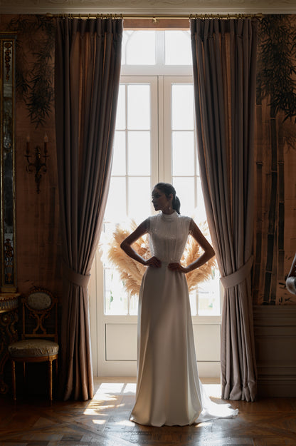 Sleeveless satin wedding dress with lace bodice & court train