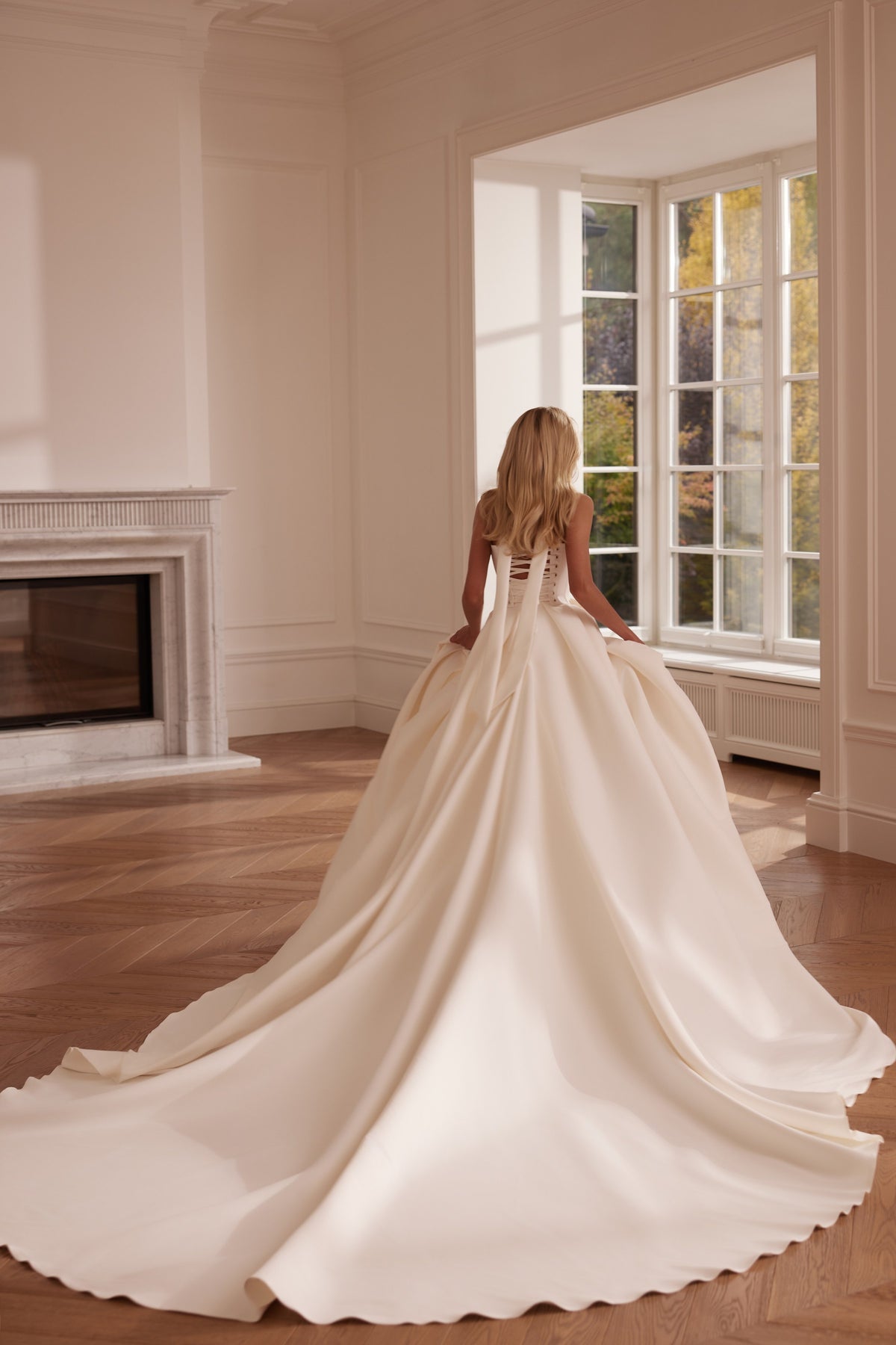 Mikado ball gown with strapless corset and extra-long train - back view