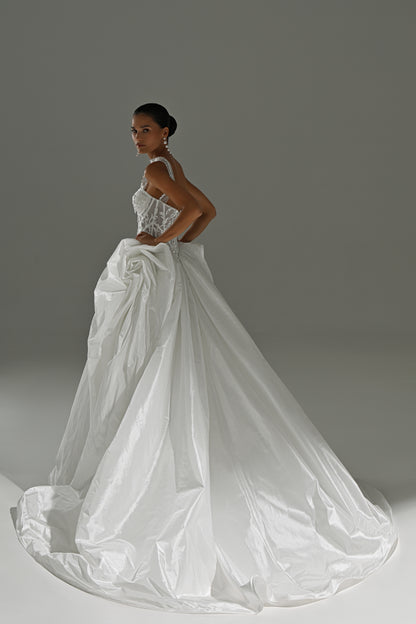 Taffeta ball gown wedding dress – three-quarter back view of the full skirt and train