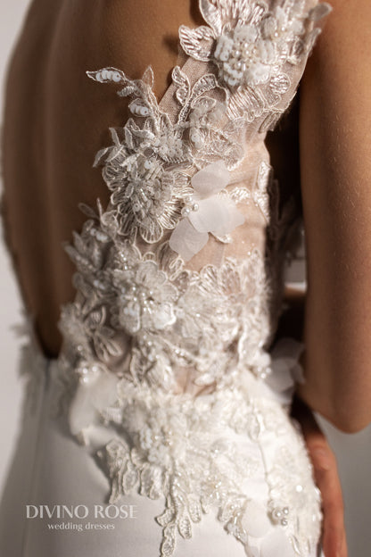 Mermaid wedding dress with deep-V neckline and fishtail train
