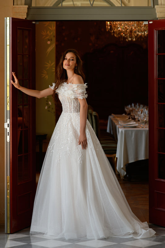 Princess tulle wedding dress with floral bolero and chapel train