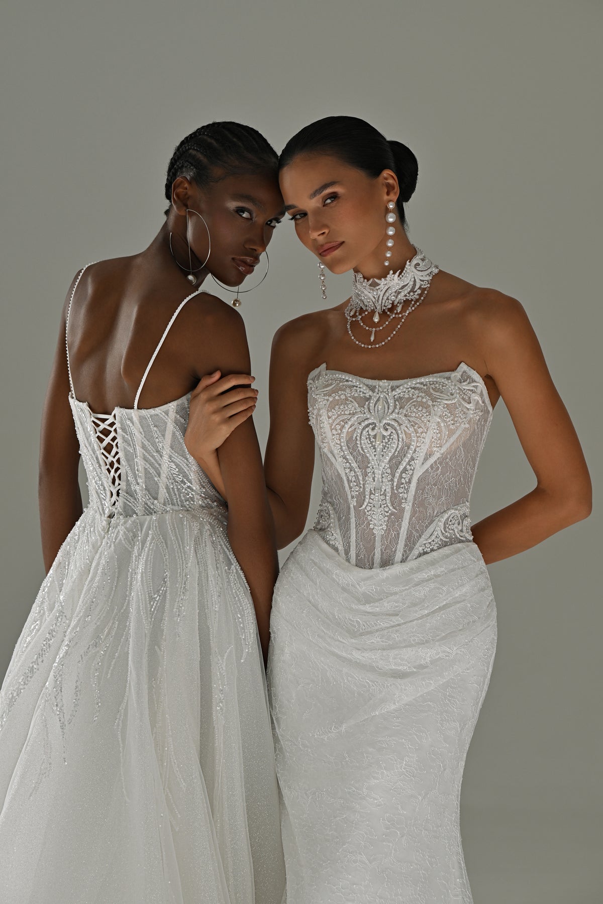Lace sheath wedding dress with strapless corset – close-up of the lace-up back and the front corset