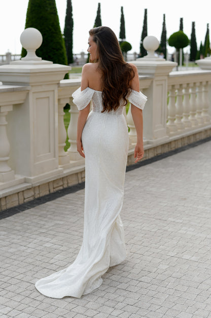 Glitter sheath wedding dress with sequin bodice and train.