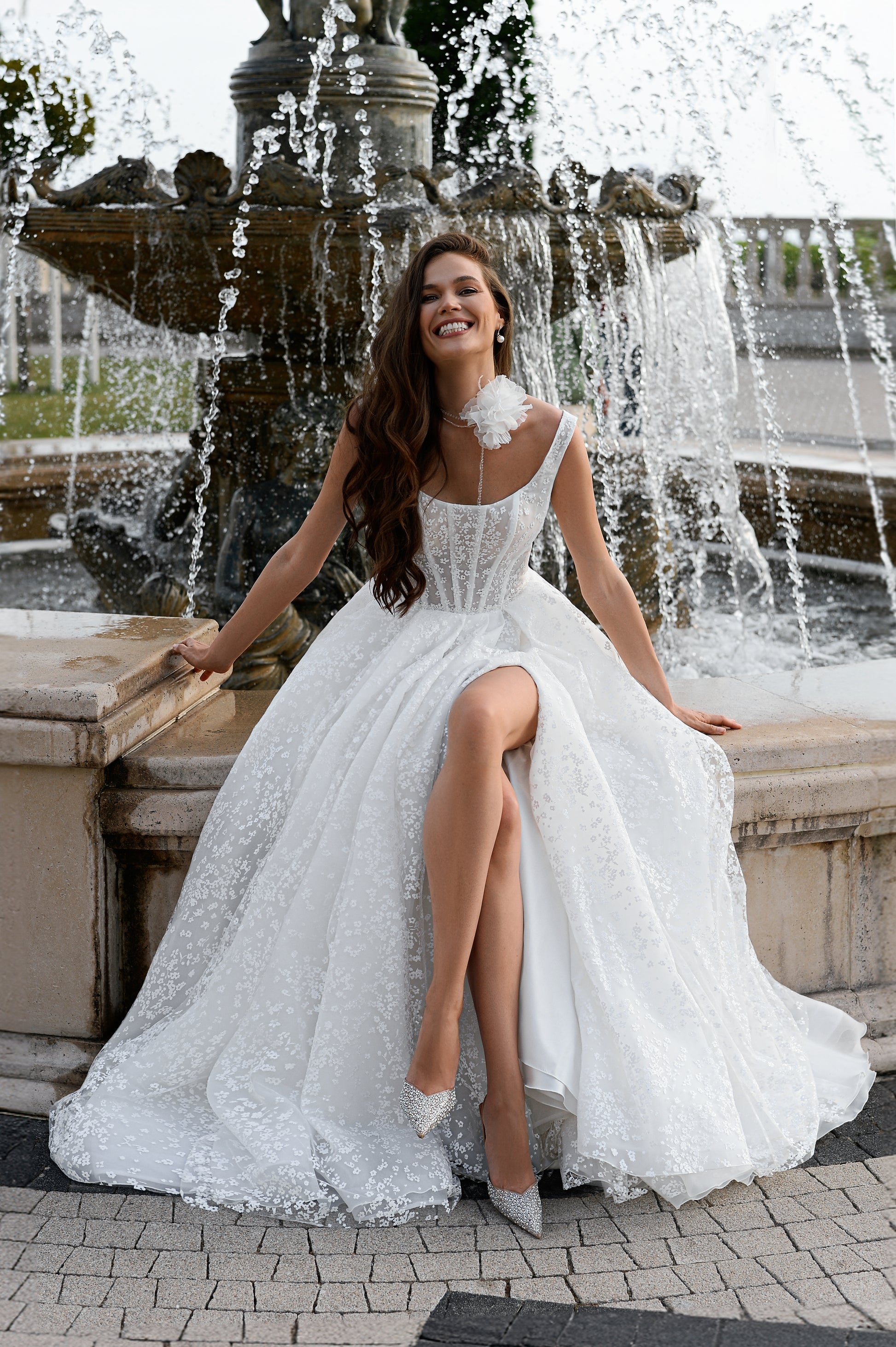 A-line wedding dress with boat neckline and scoop open back.