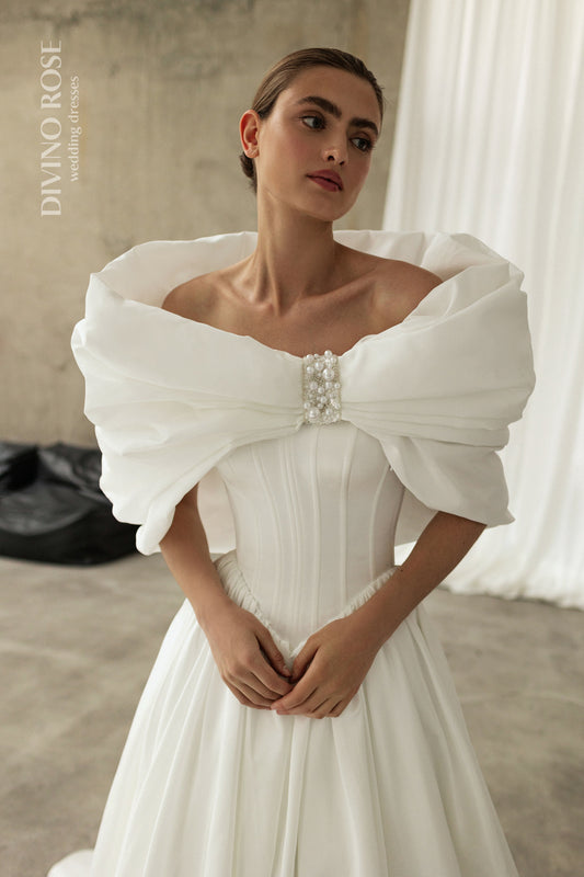 Princess  A-line Off the shoulder Sleeveless Voluminous puffy draped neckline Drop-down waist Chapel train Satin Wedding dress