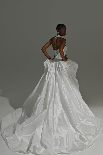 Taffeta ball gown wedding dress with oversized bow skirt – back view of the lace-up corset and full skirt