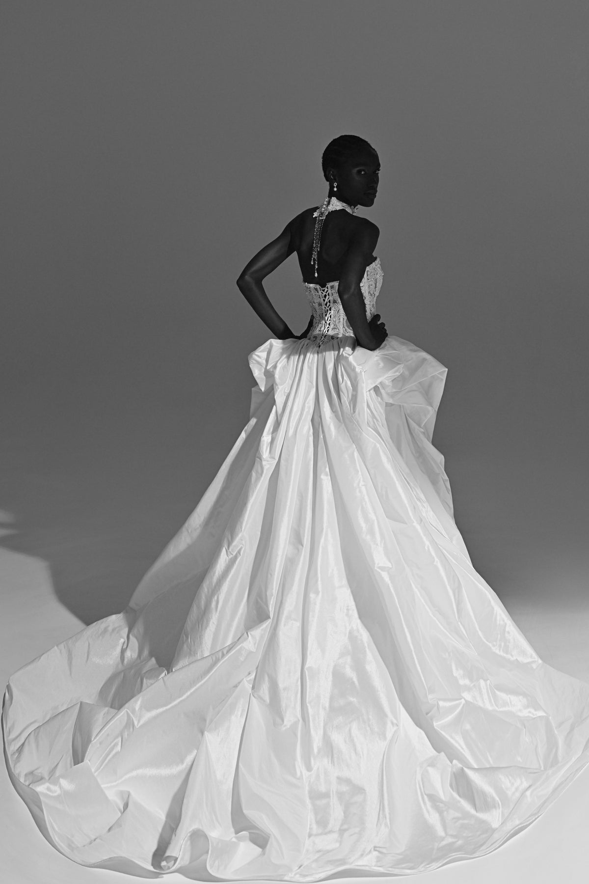 Taffeta ball gown wedding dress – back view with the long train spread out