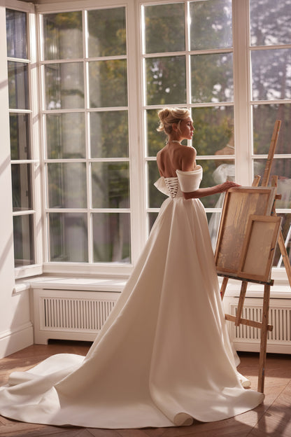 Mikado A-line wedding dress with pleated off-the-shoulder neckline and high slit - back view