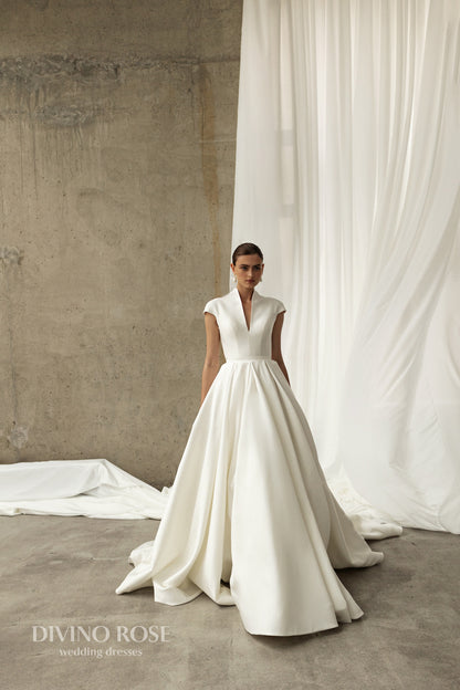 Minimalist Plain Sleeveless Halter neckline Open keyhole back Zip closure A-line Chapel train Mikado Wedding Dress