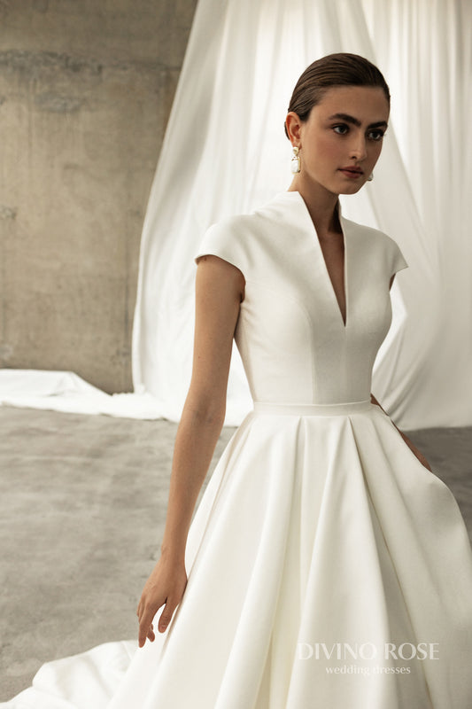 Minimalist Plain Sleeveless Halter neckline Open keyhole back Zip closure A-line Chapel train Mikado Wedding Dress