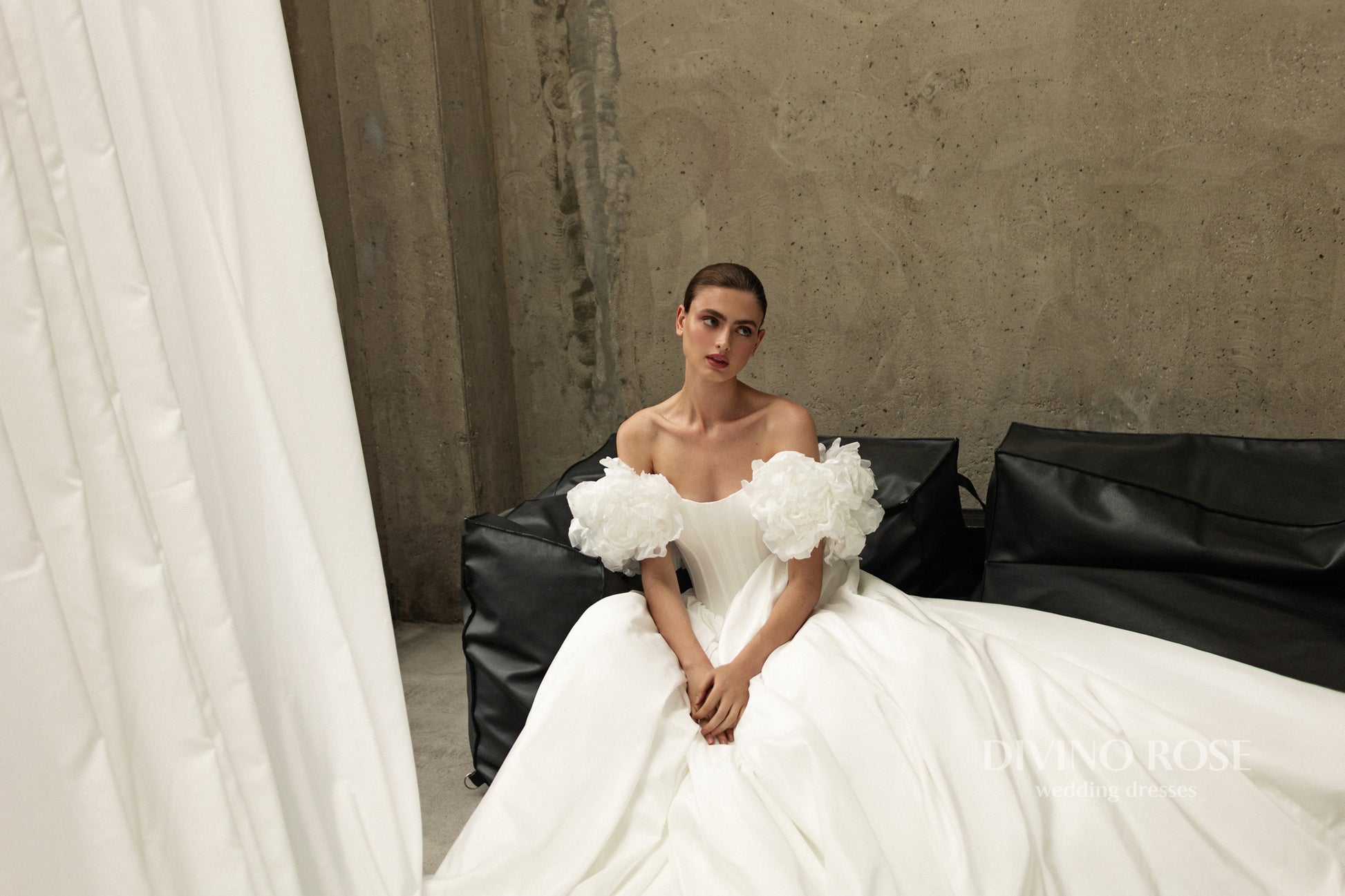 A-line corset wedding dress with boat neckline and sleeves