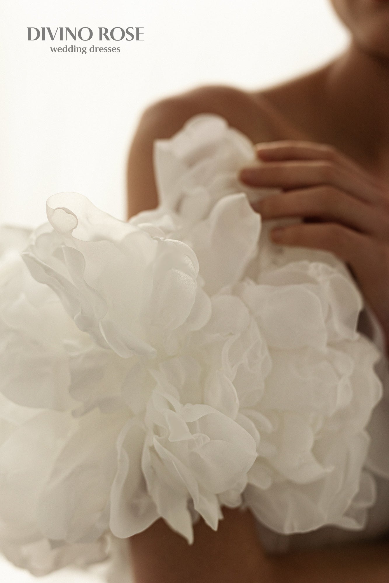 A-line corset wedding dress with boat neckline and sleeves