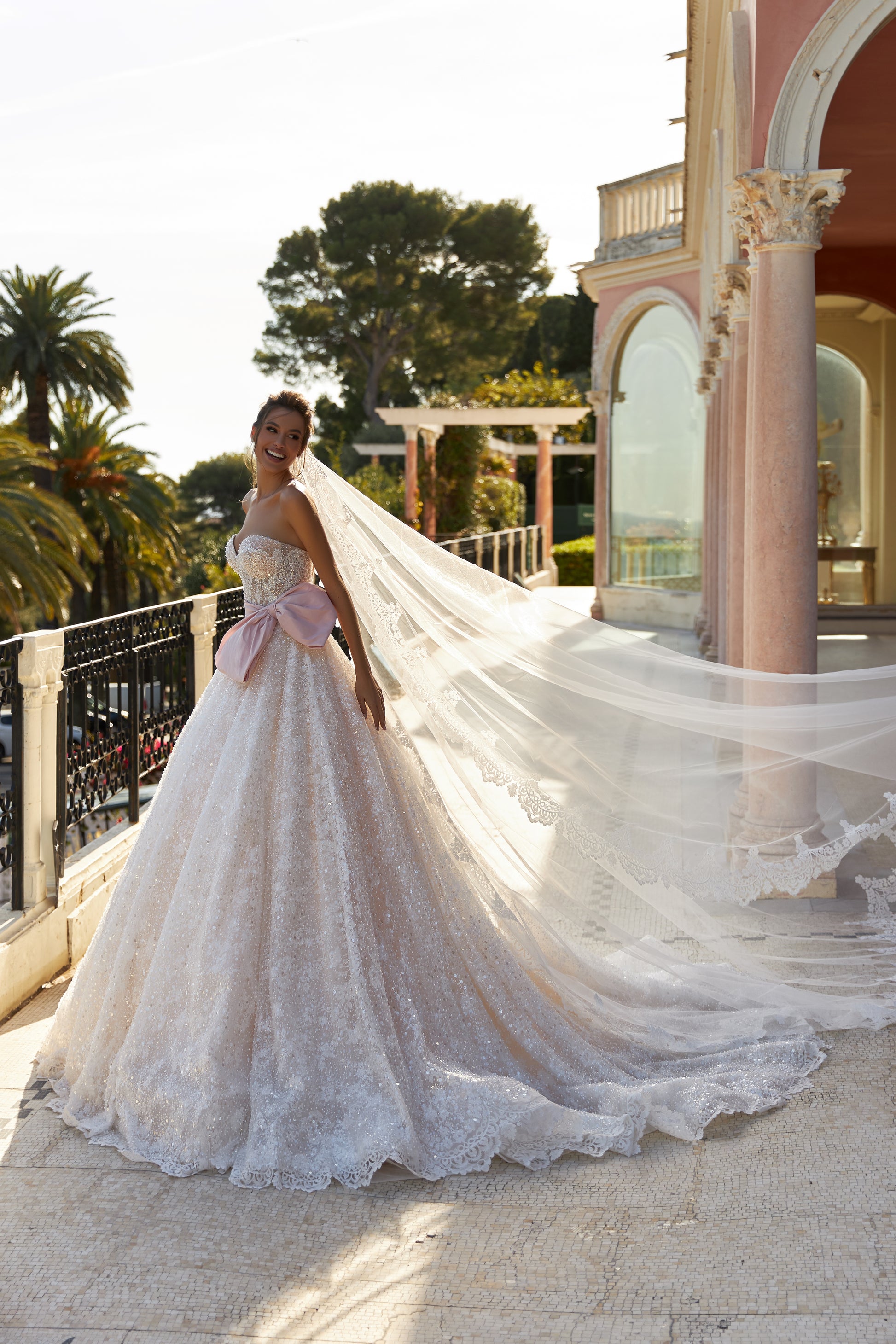 A-line sleeveless wedding dress with blush belt