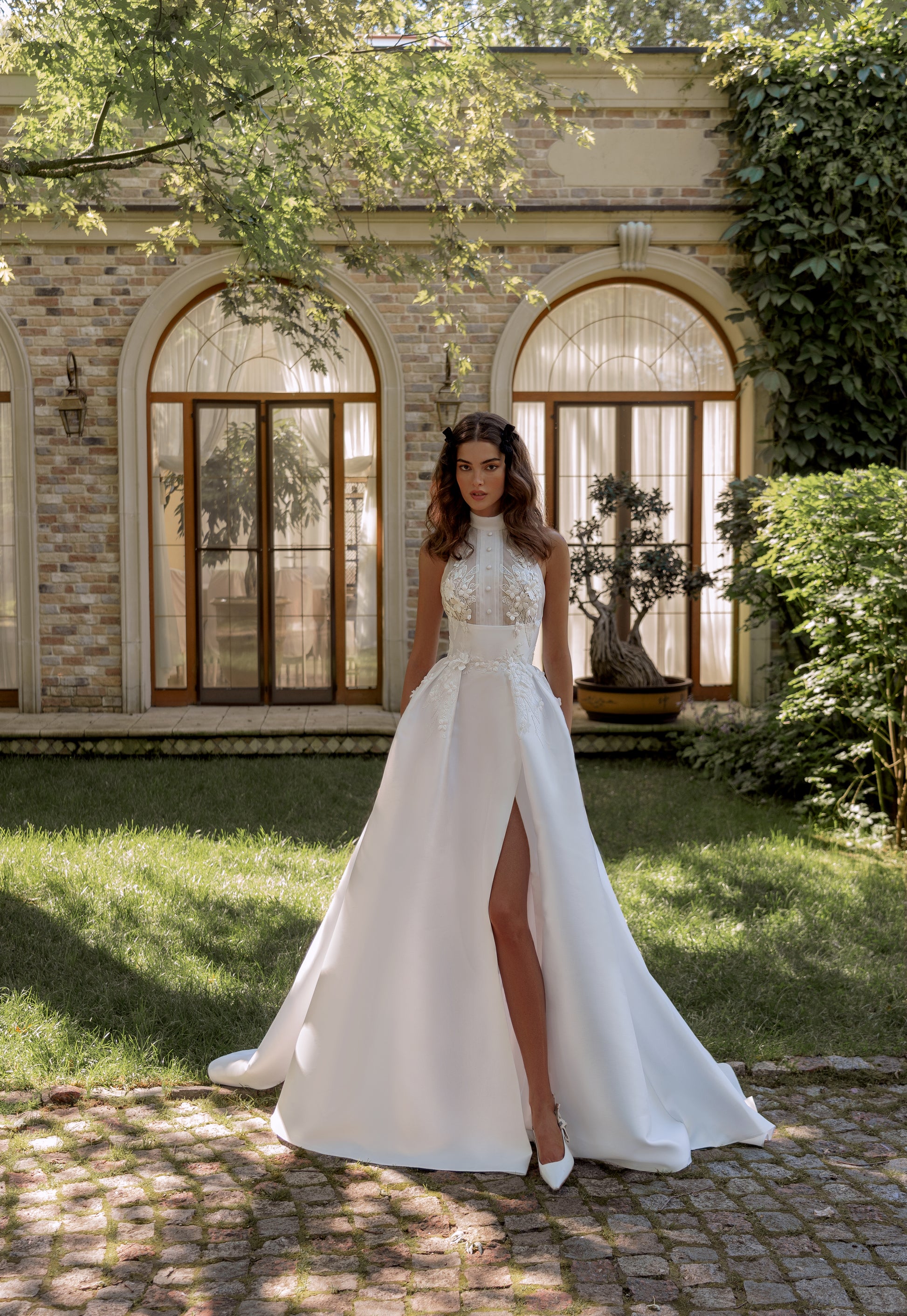 Sleeveless Mikado wedding dress with court train & slit skirt