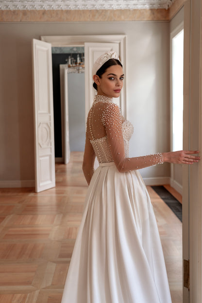 Wedding dress with pearls and long illusion sleeves